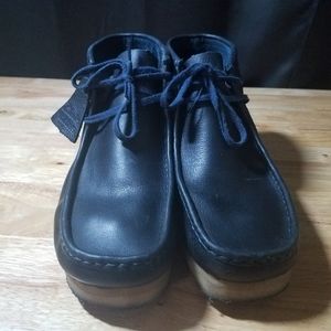 navy blue leather wallabees